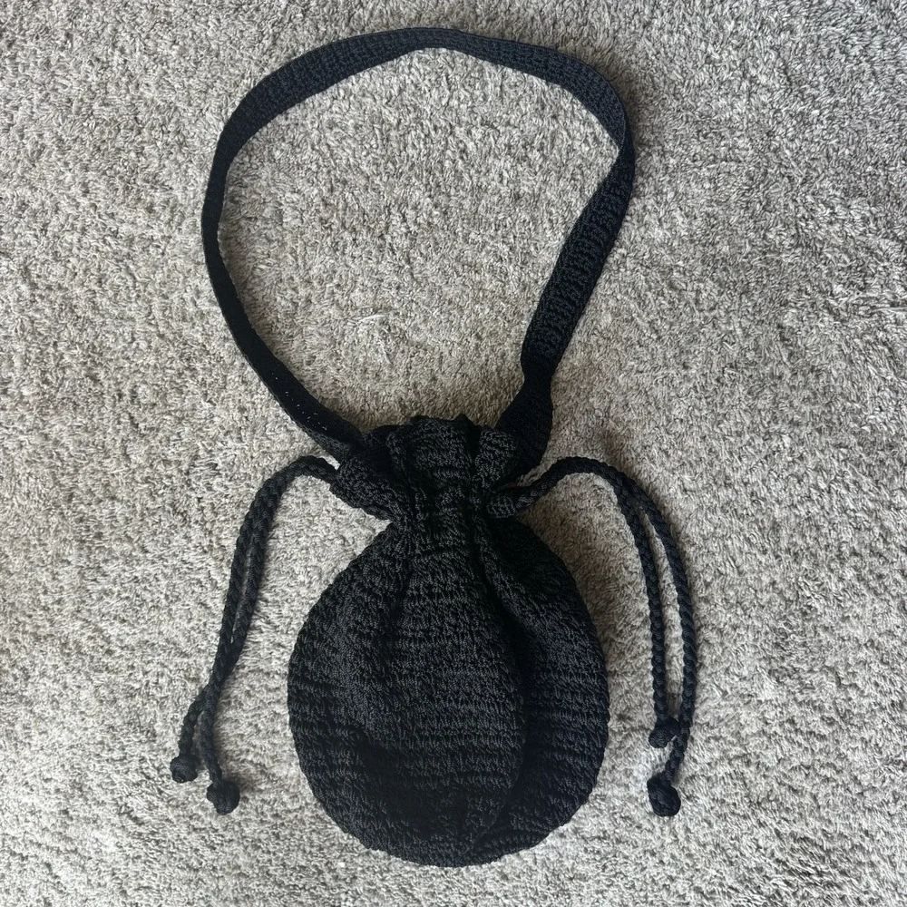 THE SAK Crochet Drawstring Purse Backpack Black Bucket Handbag Excellent